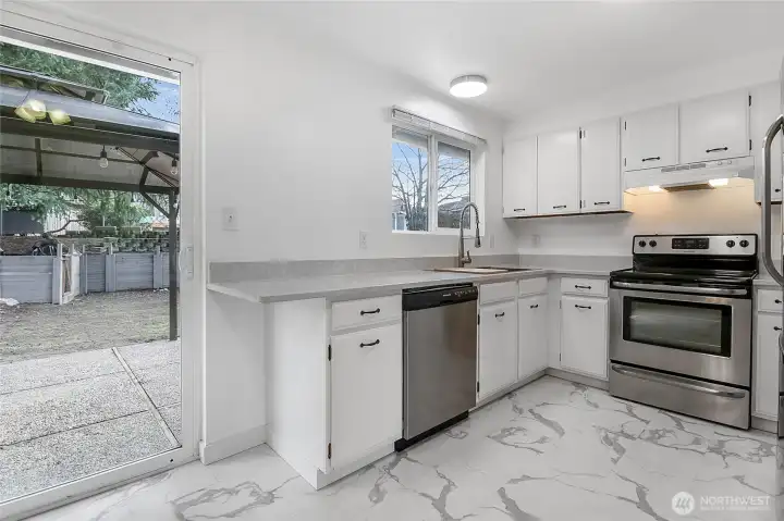 The kitchen is well laid out, with an adjacent eating area too!