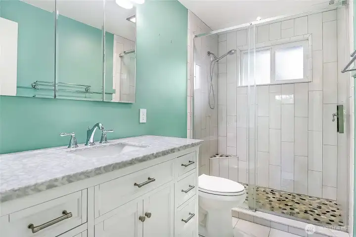 Can you believe how beautiful this is? The first of two 3/4 bathroom (showers only; neither bathroom has a tub).