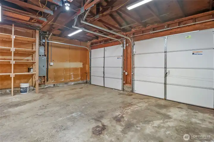 Simply remove the shelving shown on the left and you'll have even more garage space.