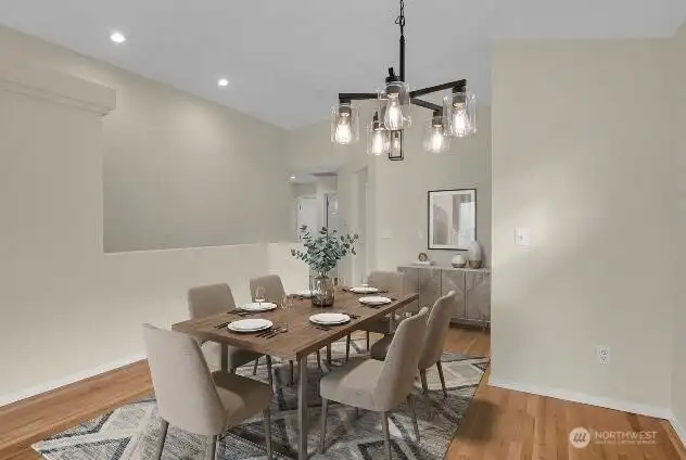 Virtually staged. Enjoy the simple pleasure of sitting together in the dining area.