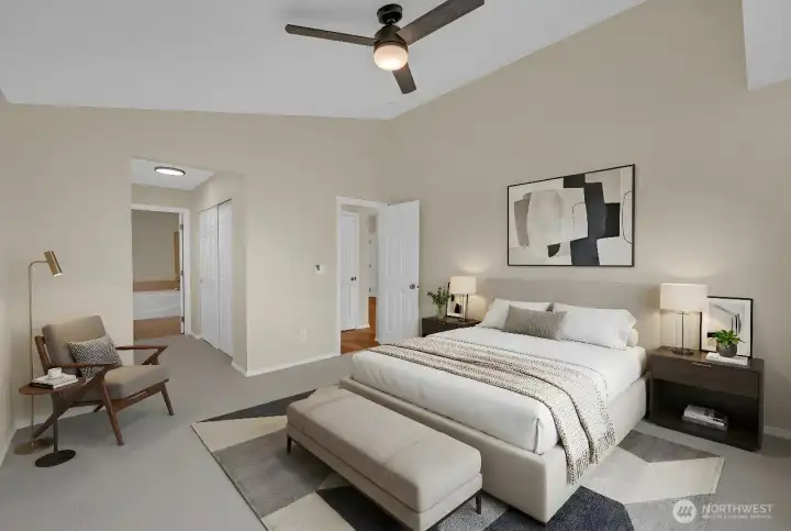 Virtually staged. Spacious primary bedroom offers respite at the end of the day.