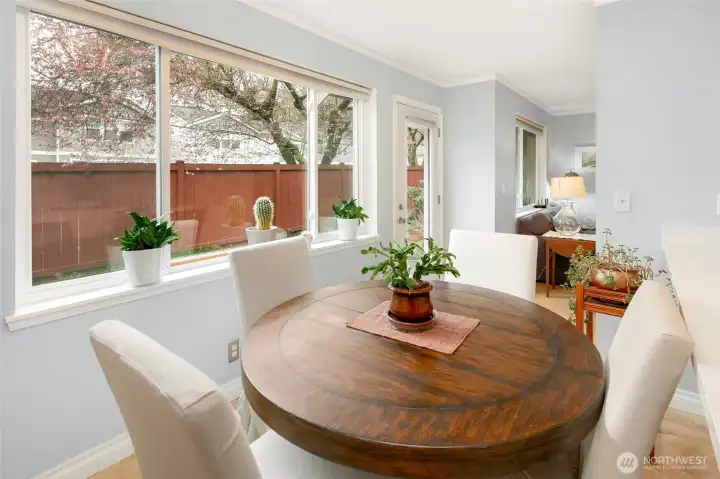 Dining room looks out to your backyard with cherry tree views in spring!