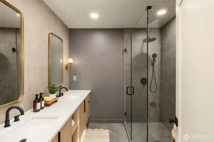 Spa-inspired bathroom with a walk-in shower and designer-selected tile work.
