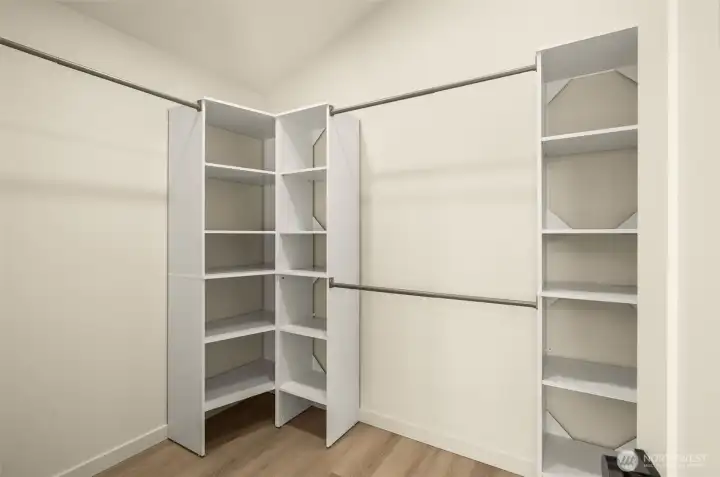 Custom walk-in closet system designed for maximum organization and efficiency.