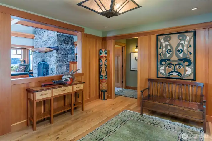 Spacious entry with madrona floors and straight grain fir woodwork.