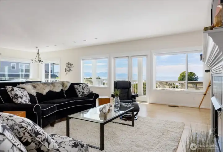 Living Room has plenty of windows to make the area light & bright, plus excellent views of the water & mountains.