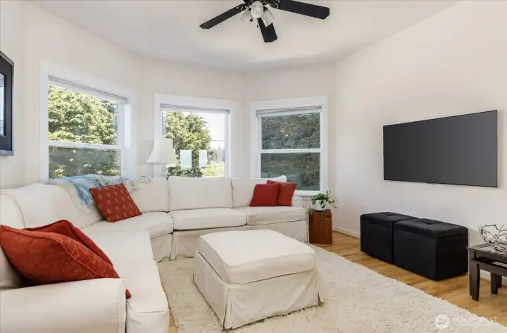 Next t the Living Room area is a separate TV sitting/viewing area with views out to the front yard.