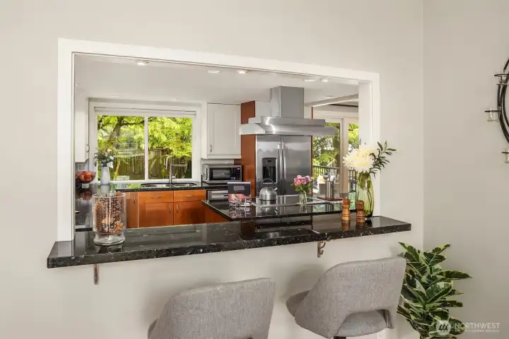 Pass through convenience from both the dining and living rooms