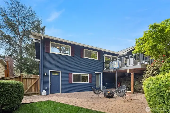 Well balanced outdoor space offers a little something for everyone!  Basketball, gardening, al fresco dining or simply relaxation.