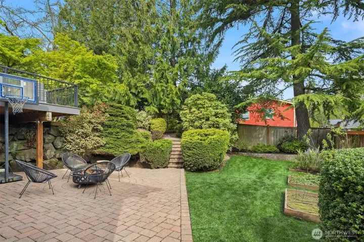 Enjoy S'mores by the fire or fresh strawberries from your raised garden beds