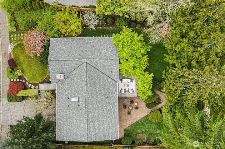 An aerial view of the yard and brand new roof!