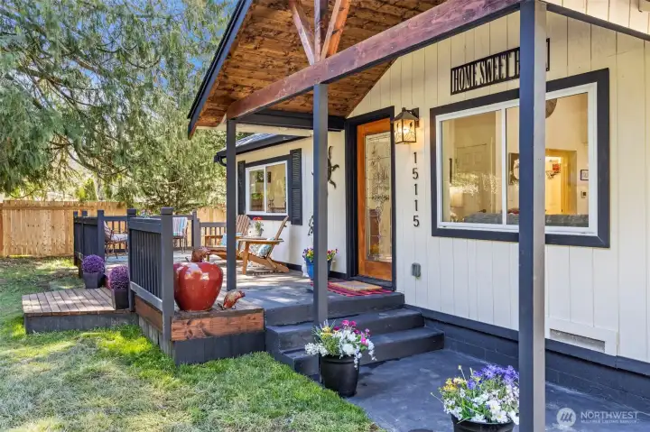 Enjoy your front porch and wrap around deck viewing the 2 large lawn areas while enjoying a cup of coffee with Virgin Cedars surrounding the property!