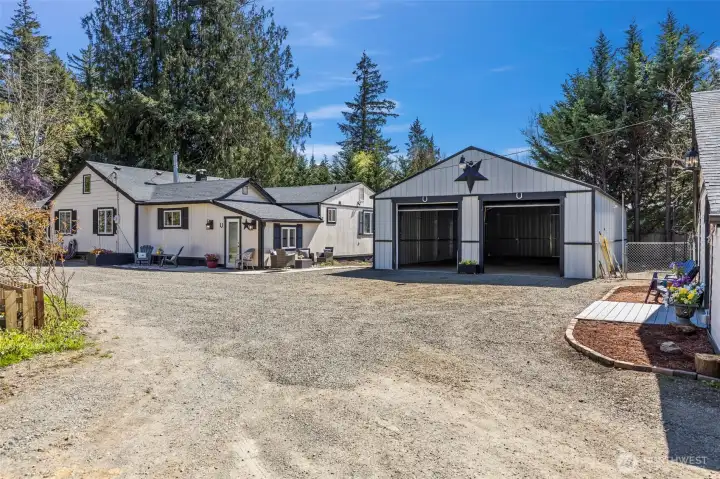 Back of house and shop with parking galore!