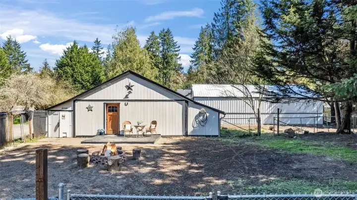 Back of barn, fenced, private with deck and firepit area!  Perfect for chickens & goat or small livestock!