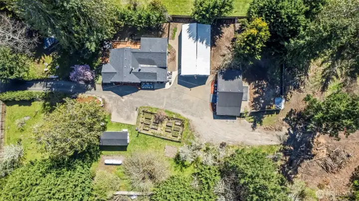 Aerial View of House, Well house, Shop, Barn/ADU and raised garden!