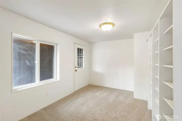 Craft room / home office. Access to the carport.