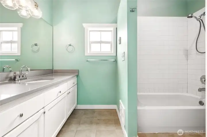 Bright, spacious upper level full bathroom.