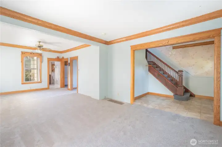 Living room looking toward dining room. Notice the custom oak trim detail.