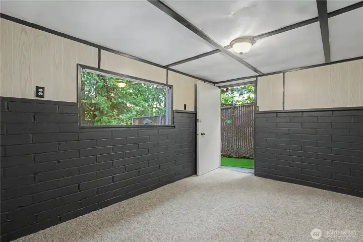 Bonus detached room with bathroom and shower.  Use as guest quarters, lakeside changing room, studio, or vacation rental.
