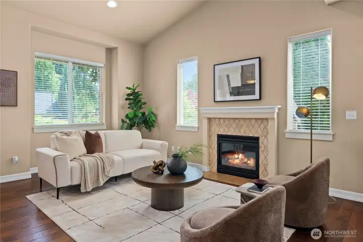 You'll love the gas fireplace with a white millwork mantle & elegant tile surround for cozy evenings on cooler days.