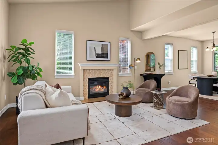 Engineered hardwood flooring spans the living spaces throughout the main floor. A generous amount of windows provide plenty of natural daylight and visual connection to nature.