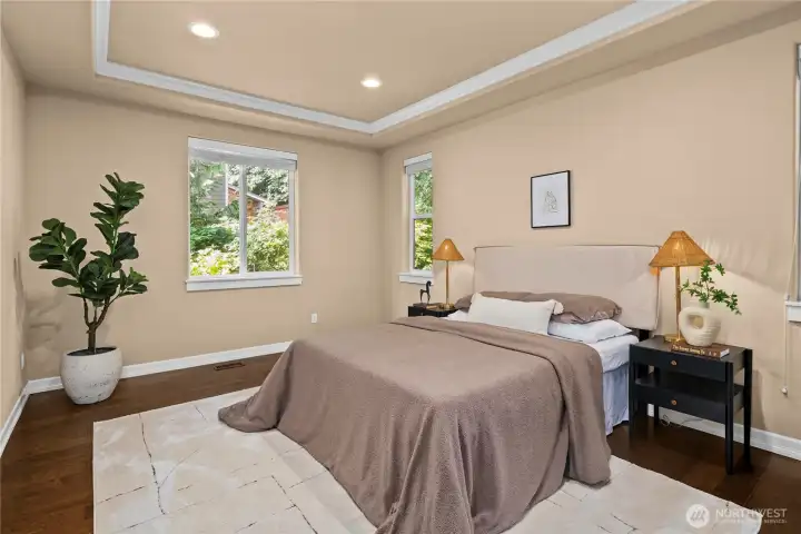 The main-floor primary bedroom is at the back of the house for a quite night's sleep and relaxation.