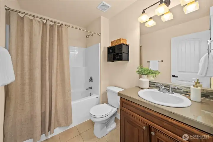 You'll find a full bath upstairs