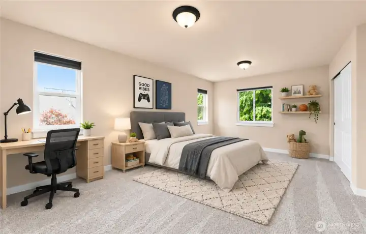 Bedroom 3 is the largest upstairs bedroom that boasts tons of natural light and could fit 2 beds!                    (photo virtually staged)