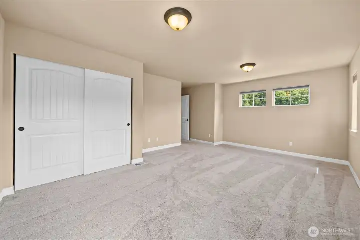 Opposite view of bedroom 3 showcases its generous size featuring plenty of windows w/up-down shades.