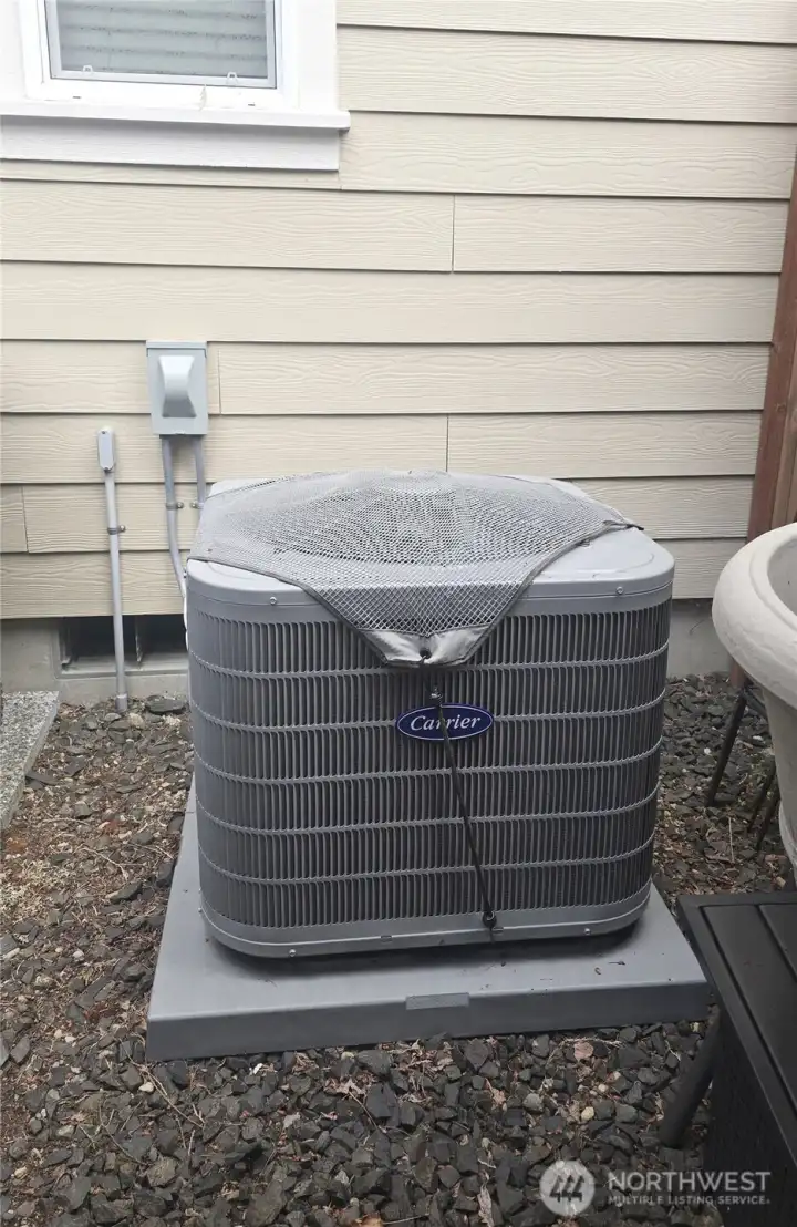 The home is appointed with AC and electric car charging.