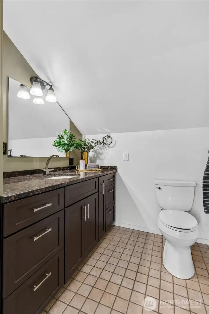 Modern cabinetry, expansive countertop space, and functional storage enhance the primary bathroom. Modern cabinetry, expansive countertop space, and functional storage enhance the primary bathroom.
