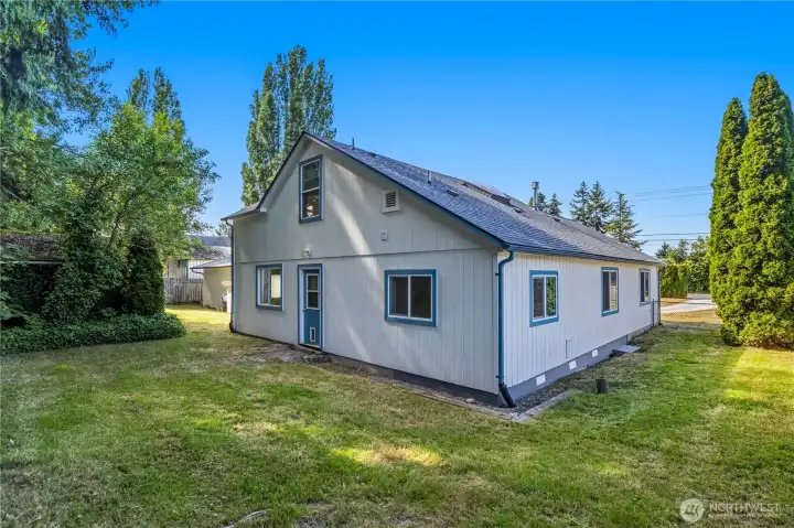 The partially fenced backyard provides room to garden, play, or simply enjoy the outdoors in a private setting. The partially fenced backyard provides room to garden, play, or simply enjoy the outdoors in a private setting.