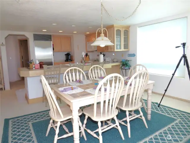 VIEW OF THE OPEN CONCEPT KITCHEN AND DINING ROOMS! NOTE THE TRIPOD IN THE CORNER TO GET BETTER VIEWS OF SHIPS AND WILDLIFE!