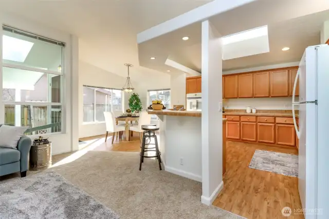 View from living room to kitchen and dining room.