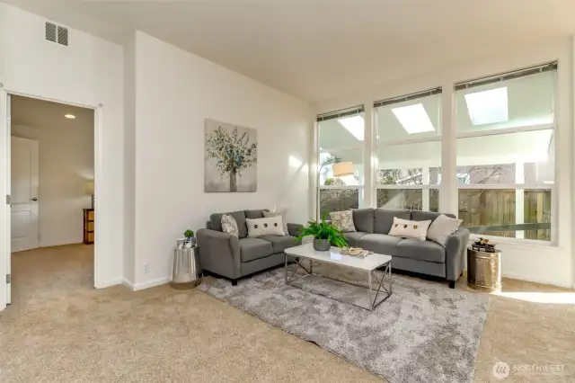 Living room with lots of window.