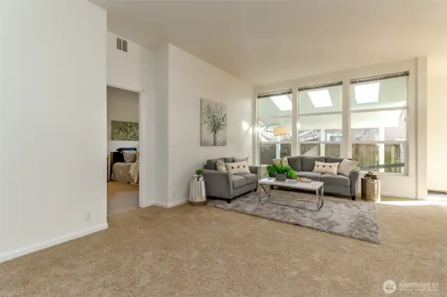 Living room with view of the large covered patio.