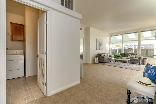Laundry room with washer and dryer included.