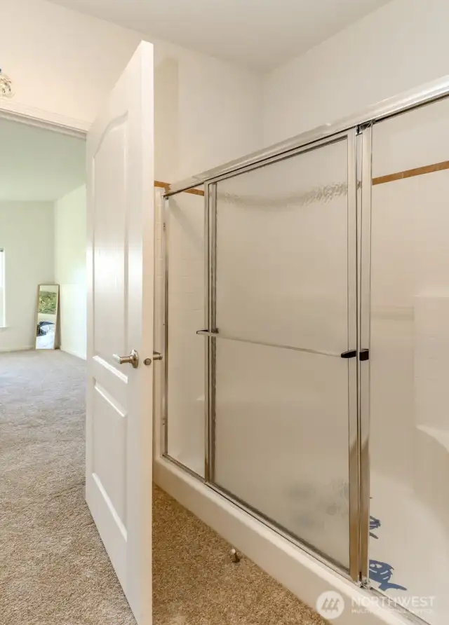 Separate shower off primary on suite.