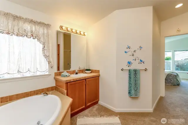 Separate vanity off primary bedroom.