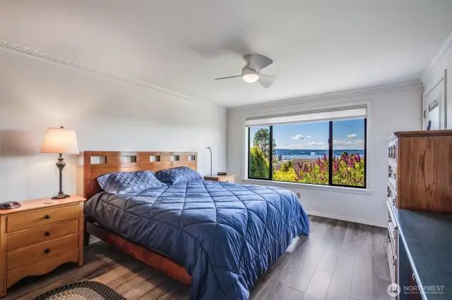 Primary suite with large closets and private access to the deck. Look at that view!