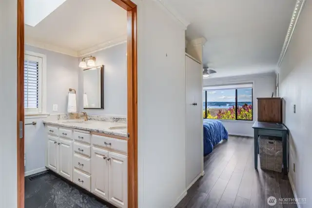 View of the ensuite bath and primary suite on the main level