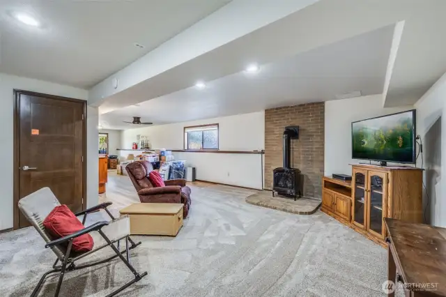 Year round comfort and loads of space in this family room with additional storage.