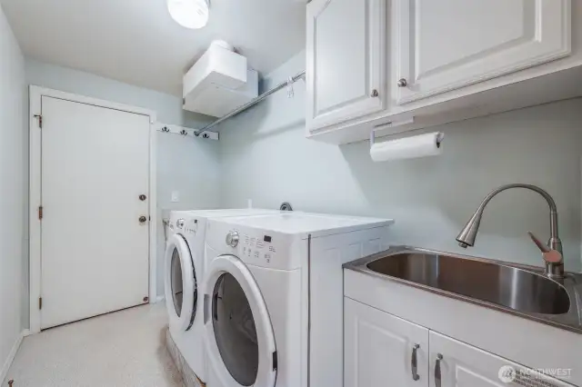 Laundry room located on main floor with garage access