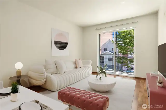 A large living space with walk out to balcony