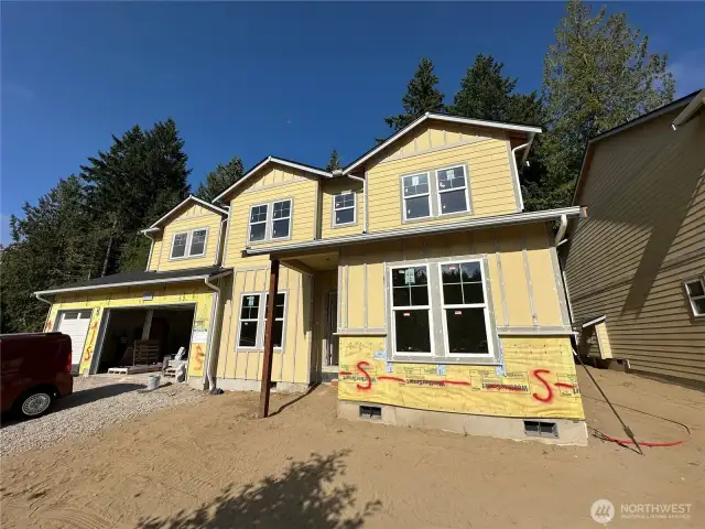 3 car garage with additional parking behind your privacy fence