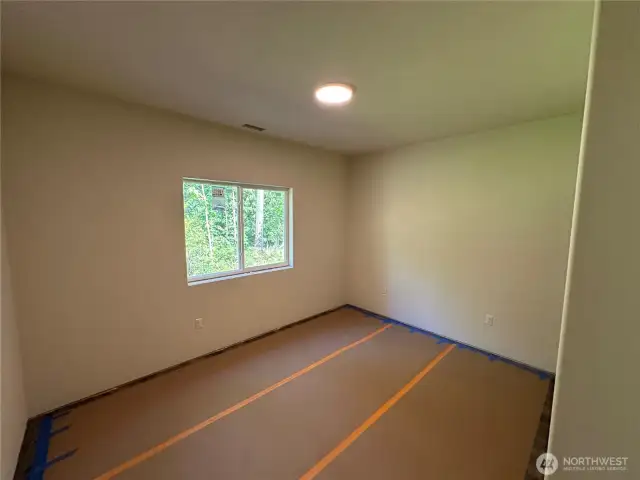 guest bed room with LVP flooring