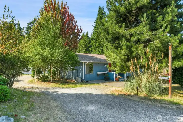 Beautiful East facing home sited on a half acre fully fenced level lot.