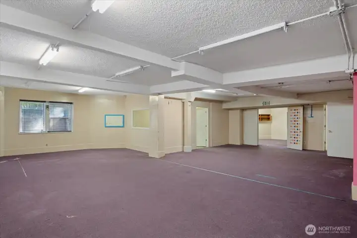 This area has been used previously as a daycare and then as a two bedroom apartment.