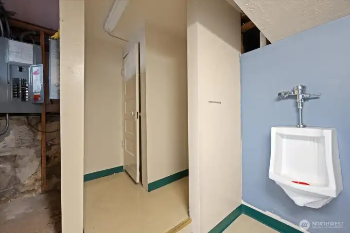 Half bath (Men's room) in lower level.