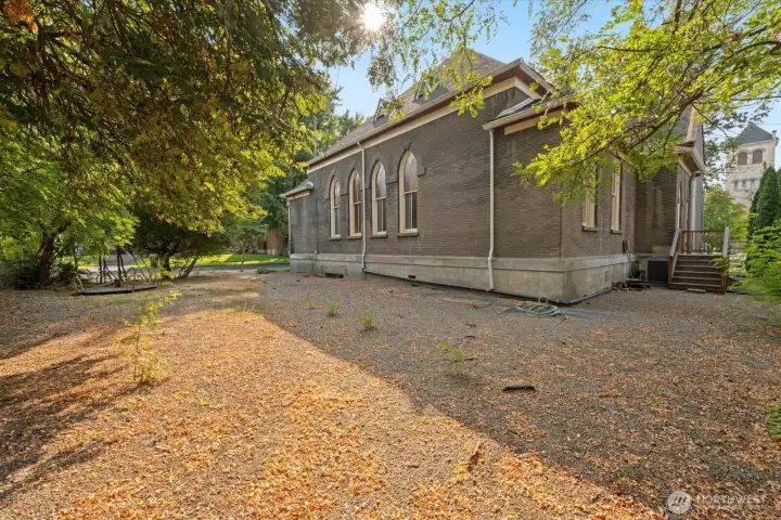 Back yard of church.  This was formally used as the parking area and rear door porch.  No curb cut.